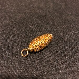 Gold Acorn pendant.